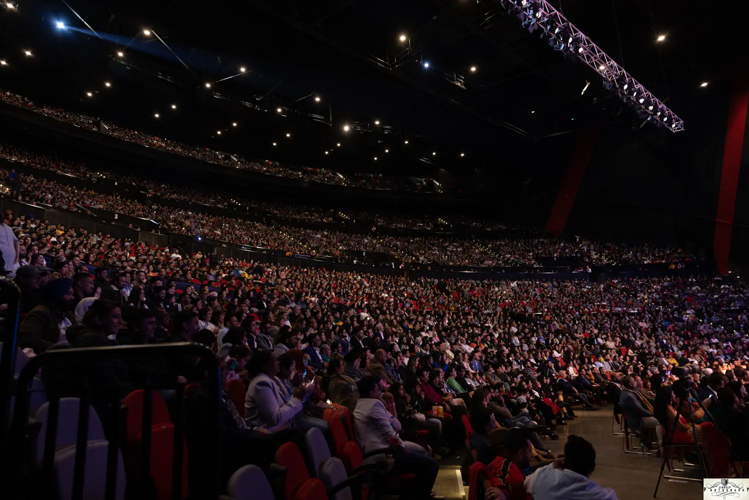Concert crowd with stage lighting at a Cinestar Events show