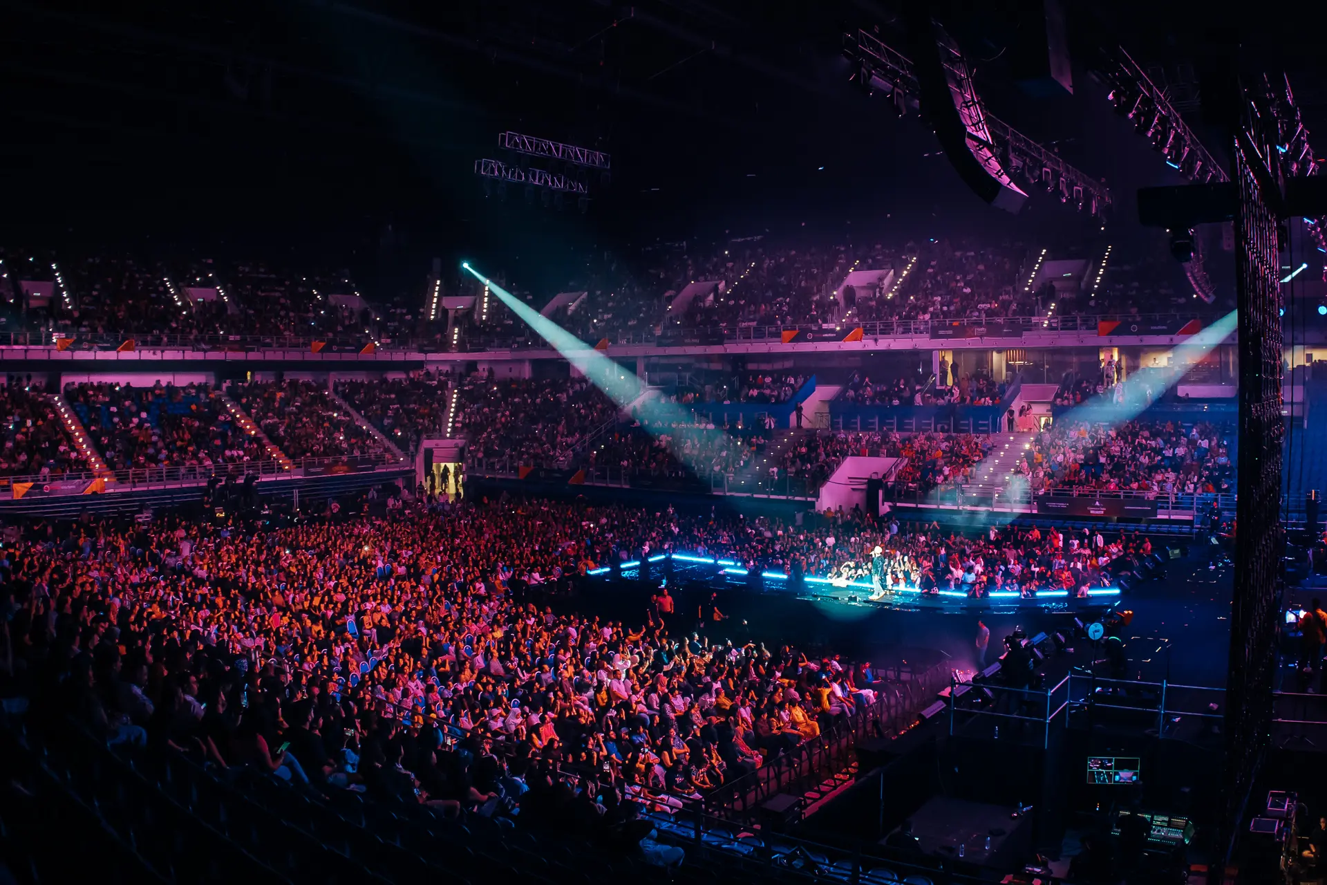 Packed venue at a Bollywood live music event